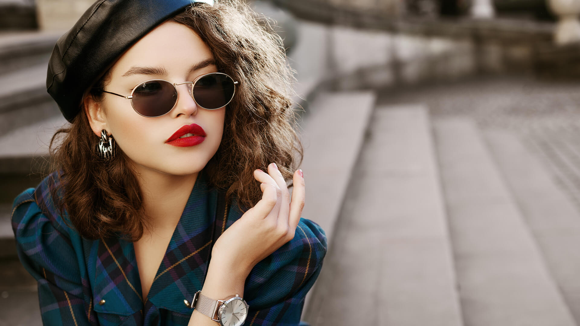 Woman with red lipstick and confident fashion sense in the street