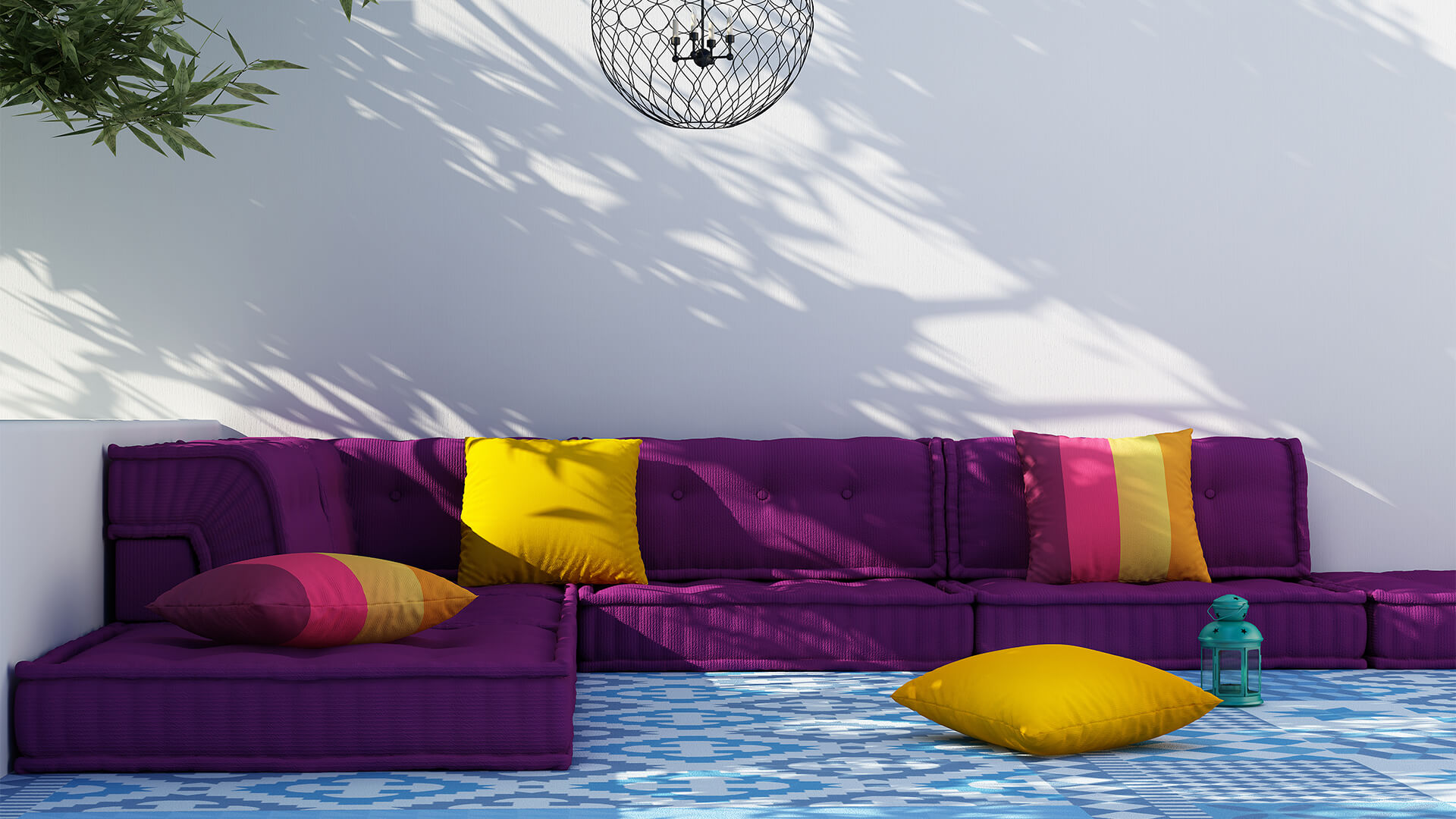 Purple sofa and bright coloured cushions in an outdoor area