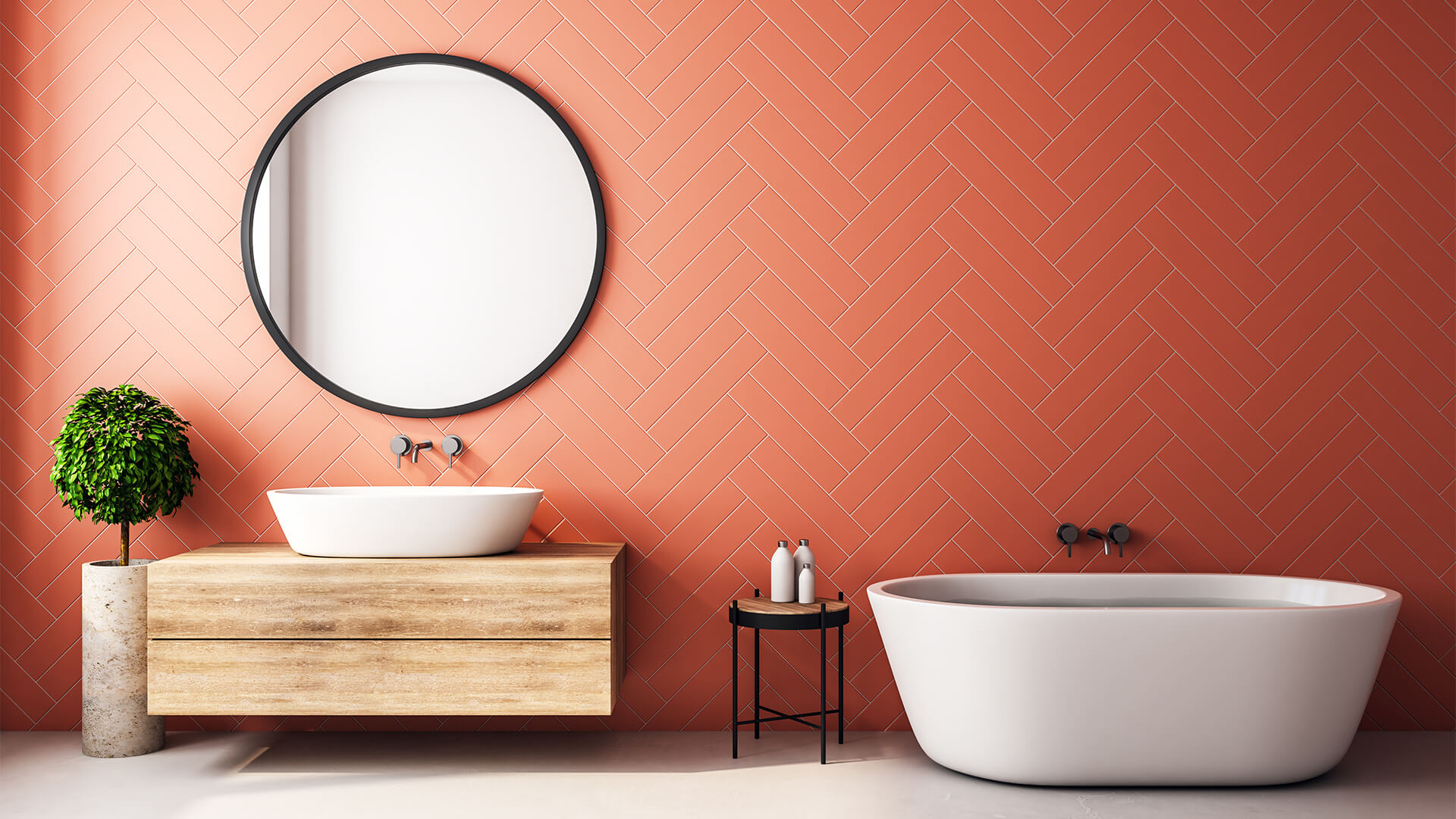 Bathroom with terracotta tiles on the walls, and a freestanding white bath