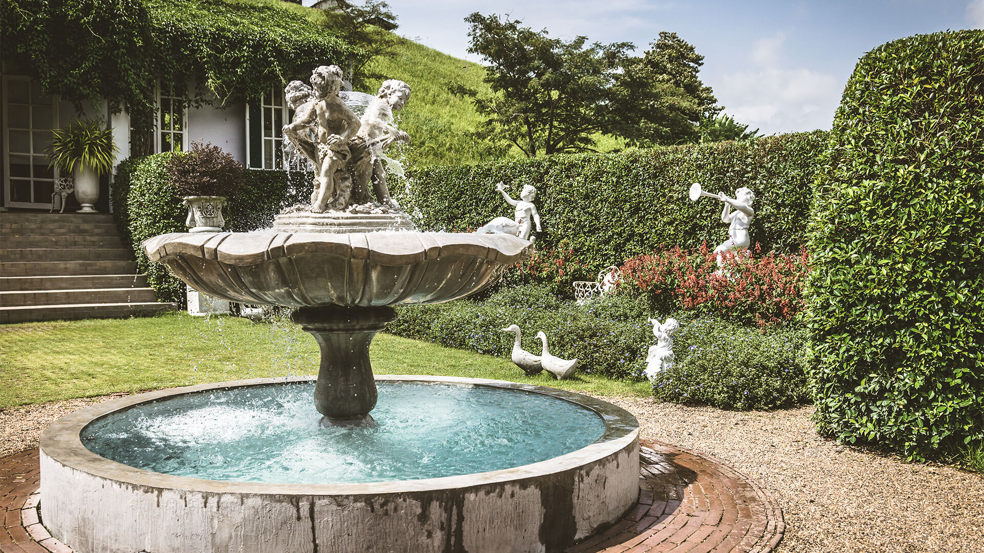 Traditional water fountain in an English garden