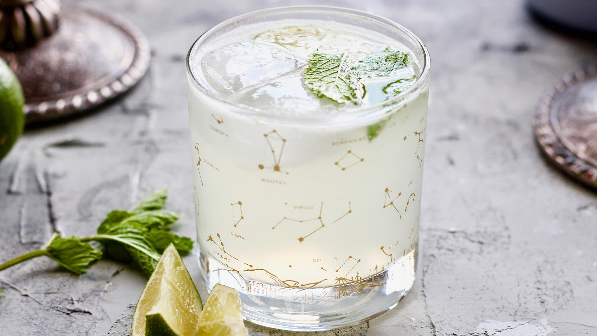 Mojito cocktail in an astrology print glass