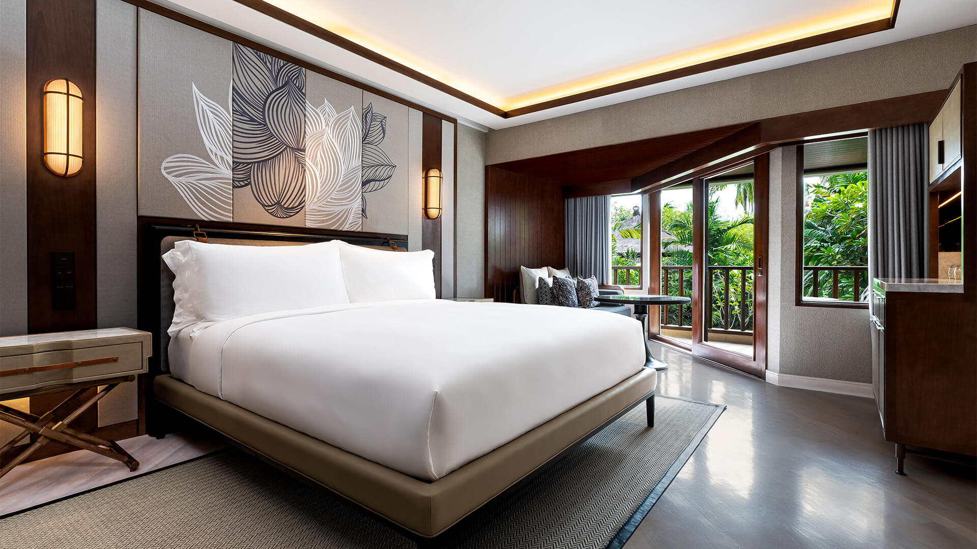 A Luxury Deluxe room with a large bed and balcony area