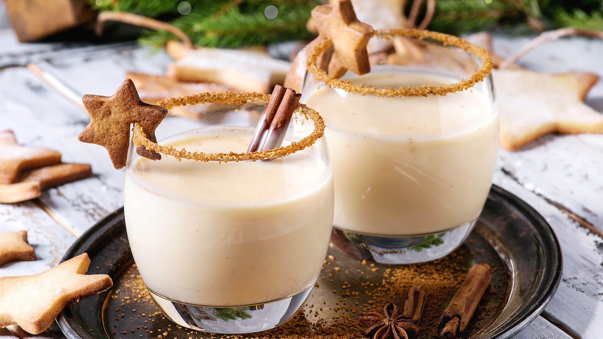 Cinnamon-Spiced Eggnog White Russian on a decorated table