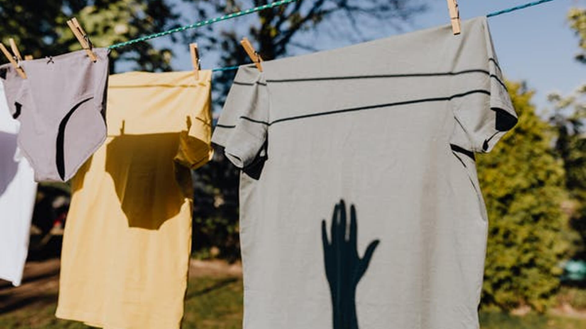 clothes drying on rope with clothespin in garden